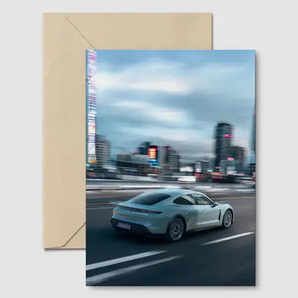Porsche Taycan Speeding Through City Streets