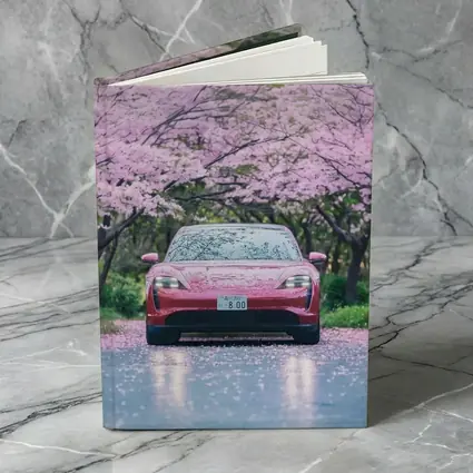 Porsche Taycan Red Under Cherry Blossoms