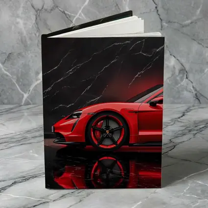 Porsche Taycan Red Against Black Marble