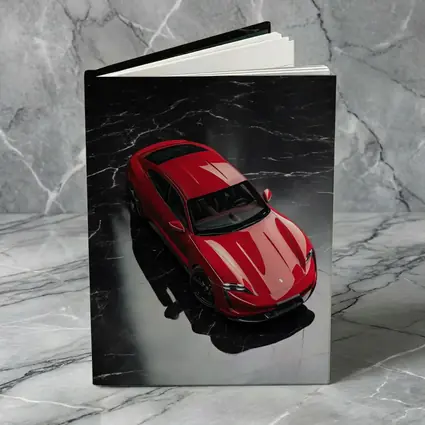 Red Porsche Taycan On Black Marble Floor