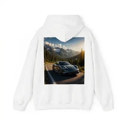 Porsche Taycan on Mountain Road at Sunset
