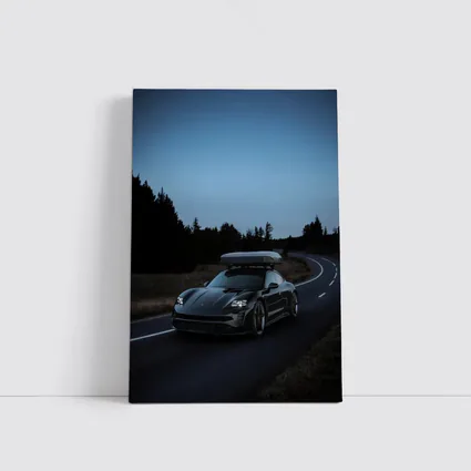 Porsche Taycan on Dark Winding Road