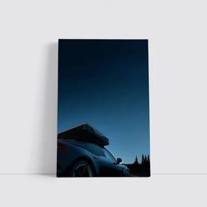 Porsche Taycan With Roof Box At Dusk