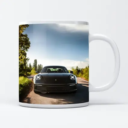 Black Porsche 911 On Tree Lined Road