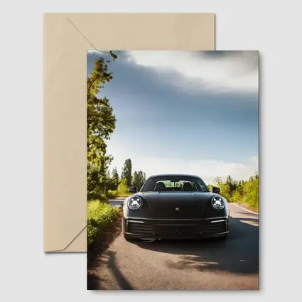 Black Porsche 911 On Tree Lined Road