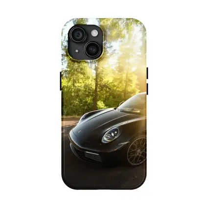Black Porsche 911 Parked in Sunlit Forest