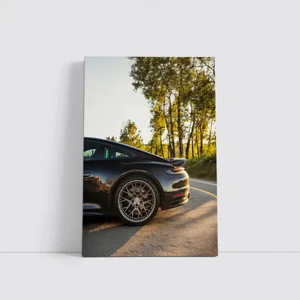 Black Porsche 911 On Scenic Forest Road