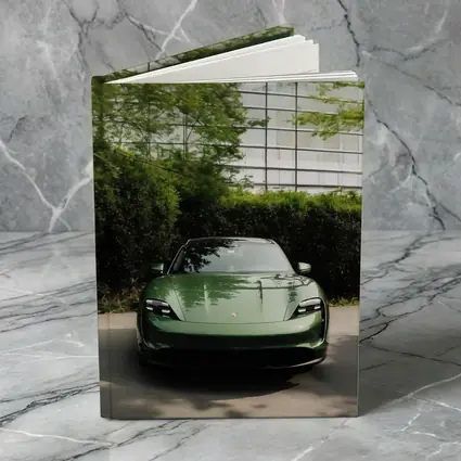 Porsche Taycan Green Front View Glass Building