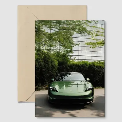 Porsche Taycan Green Front View Glass Building