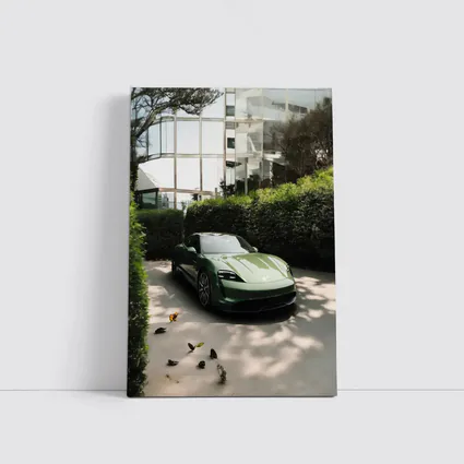 Green Porsche Taycan Parked Near Glass Building