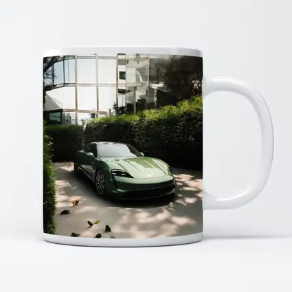 Green Porsche Taycan Parked Near Glass Building