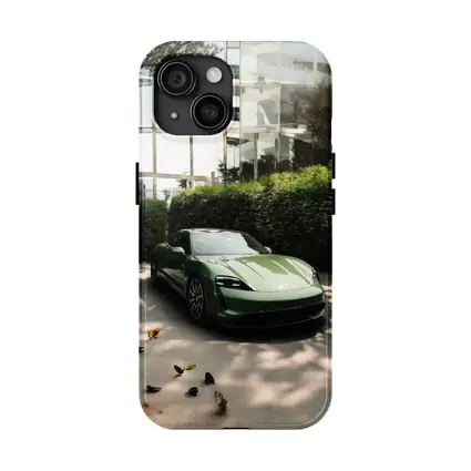 Green Porsche Taycan Parked Near Glass Building