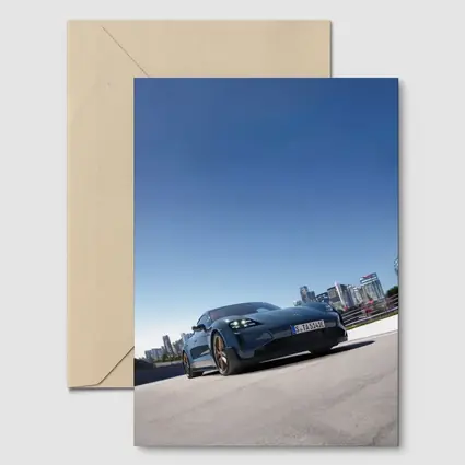 Porsche Taycan Blue City Skyline Drive