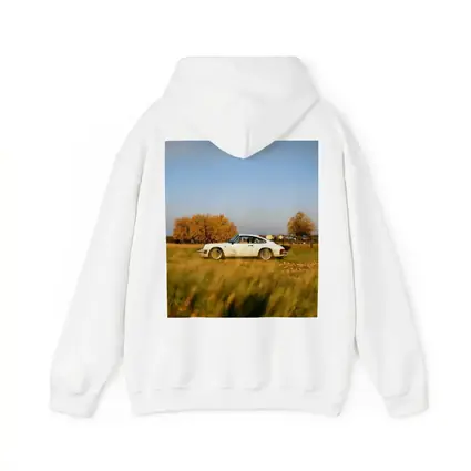 White Porsche 911 Parked in Autumn Field