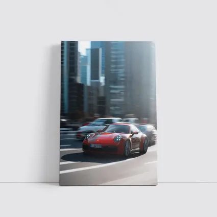Red Porsche 911 Racing Through City Streets