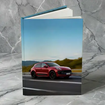 Red Porsche Macan GTS On Open Highway
