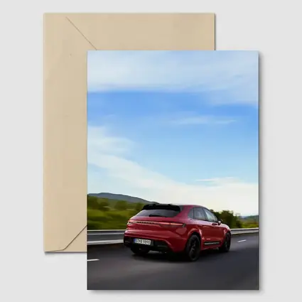 Red Porsche Cayenne Speeding On Open Road