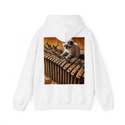Ragdoll Cat Playing Dinosaur Bone Xylophone
