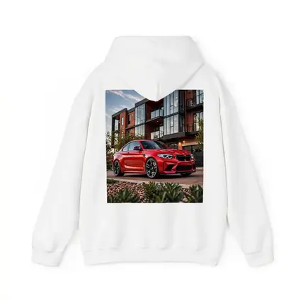 Red BMW M2 Parked Outside Modern Building