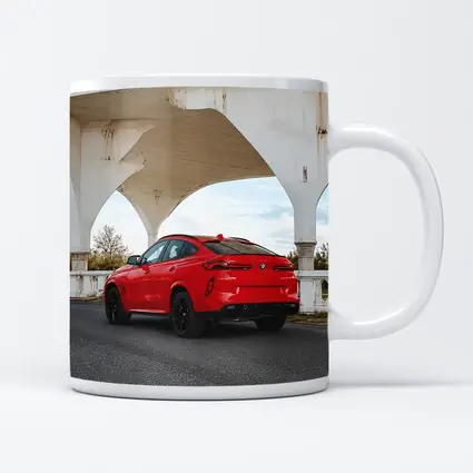 Red BMW X6M Under Concrete Bridge