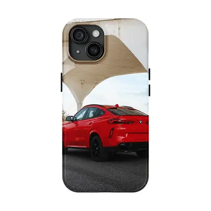 Red BMW X6M Under Concrete Bridge