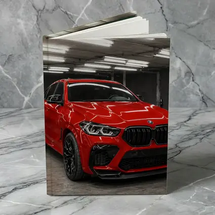Red BMW X6 M Parked In Garage