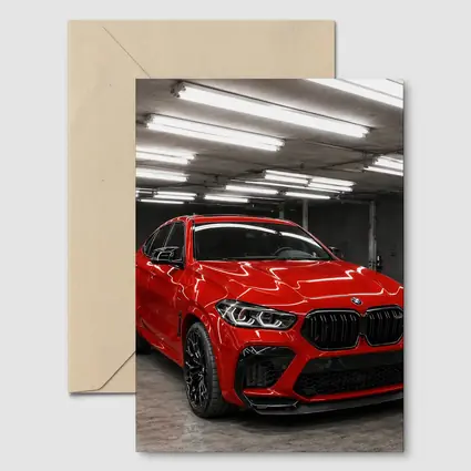 Red BMW X6 M Parked In Garage