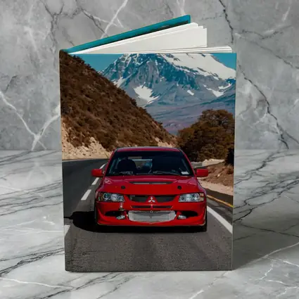 Red Mitsubishi Lancer Evo Mountain Road