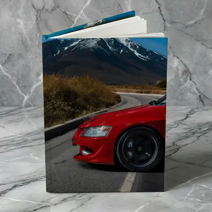 Red Mitsubishi Lancer Evolution Mountain Road