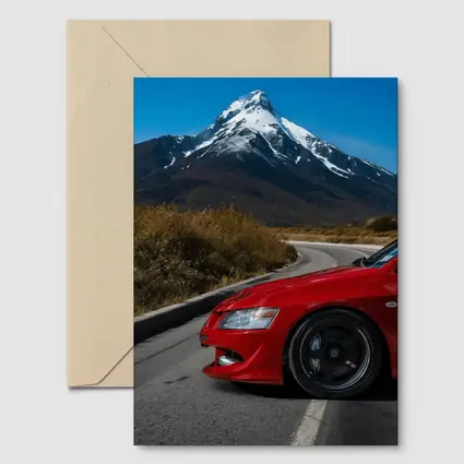 Red Mitsubishi Lancer Evolution Mountain Road