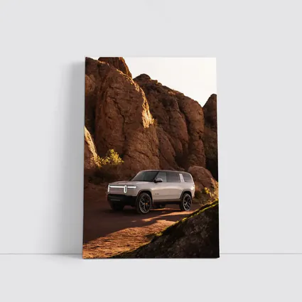 Rivian R1S SUV Rocky Desert Landscape