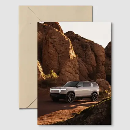 Rivian R1S SUV Rocky Desert Landscape