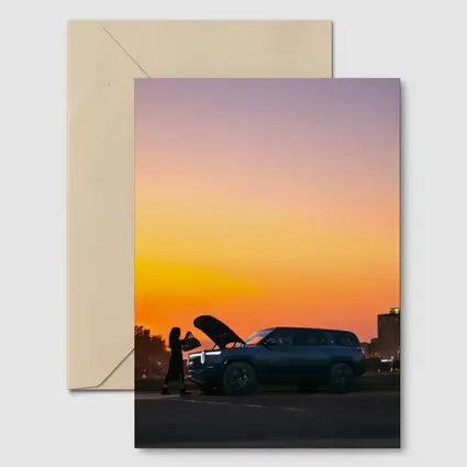 Rivian R1S Electric SUV City Sunset