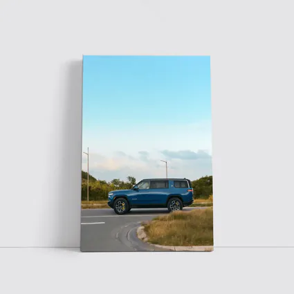 Rivian R1S Blue SUV Open Road