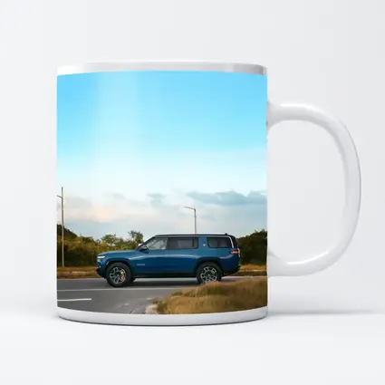 Rivian R1S Blue SUV Open Road