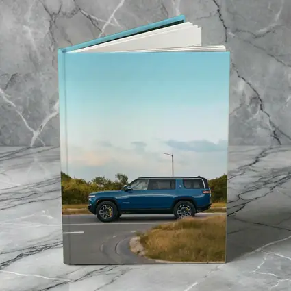 Rivian R1S Blue SUV Open Road