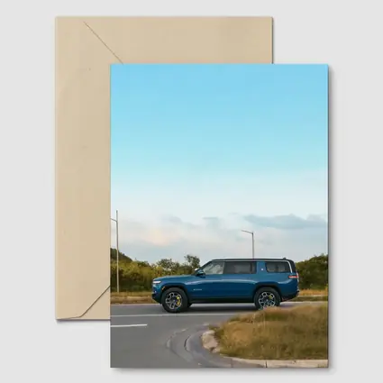 Rivian R1S Blue SUV Open Road