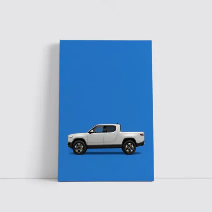 Rivian R1T White Truck Blue Background
