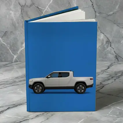 Rivian R1T White Truck Blue Background