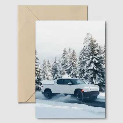 Rivian R1T White Truck Snowy Winter Forest