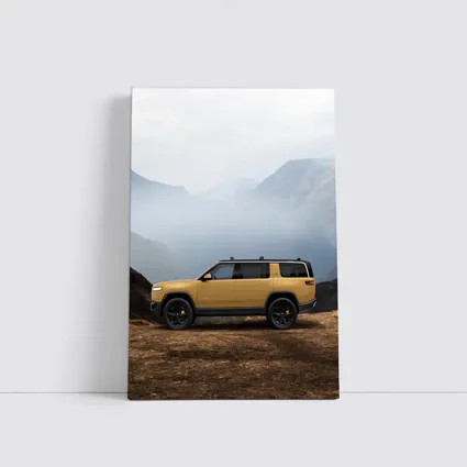 Rivian R1S Yellow SUV Mountain Landscape