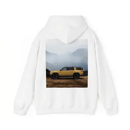 Rivian R1S Yellow SUV Mountain Landscape