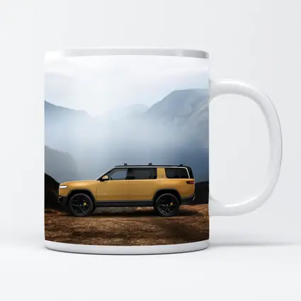 Rivian R1S Yellow SUV Mountain Landscape
