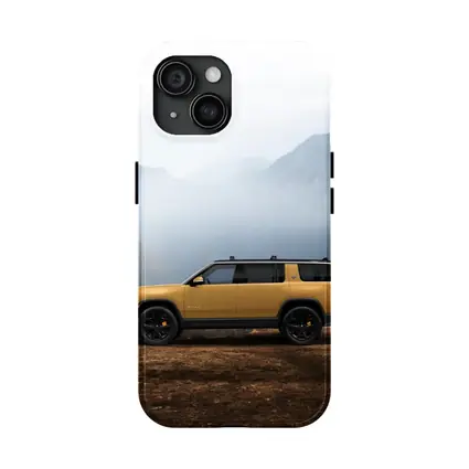 Rivian R1S Yellow SUV Mountain Landscape