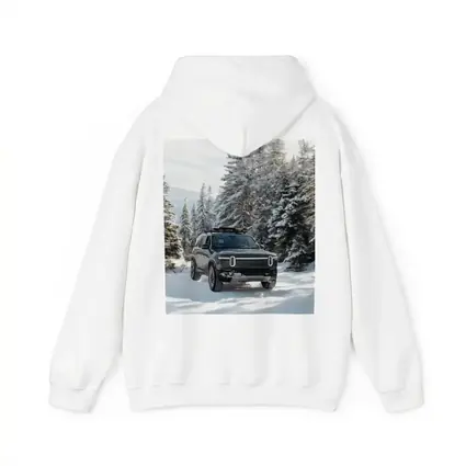 Rivian R1S Dark SUV Snowy Forest Trail