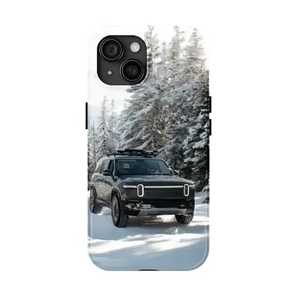 Rivian R1S Dark SUV Snowy Forest Trail