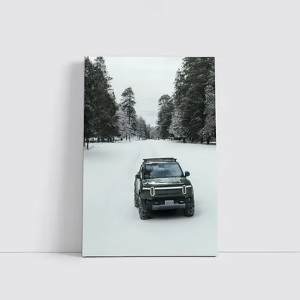 Rivian R1S Green Truck Snowy Forest Road