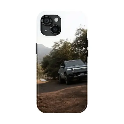 Rivian R1T Electric Truck Dirt Road Forest