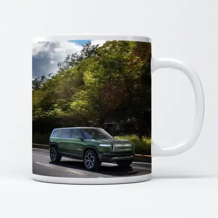 Rivian R1S Green SUV Forest Road Drive