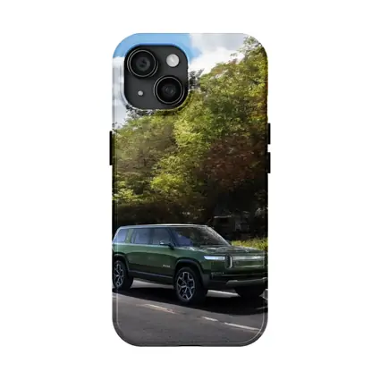 Rivian R1S Green SUV Forest Road Drive